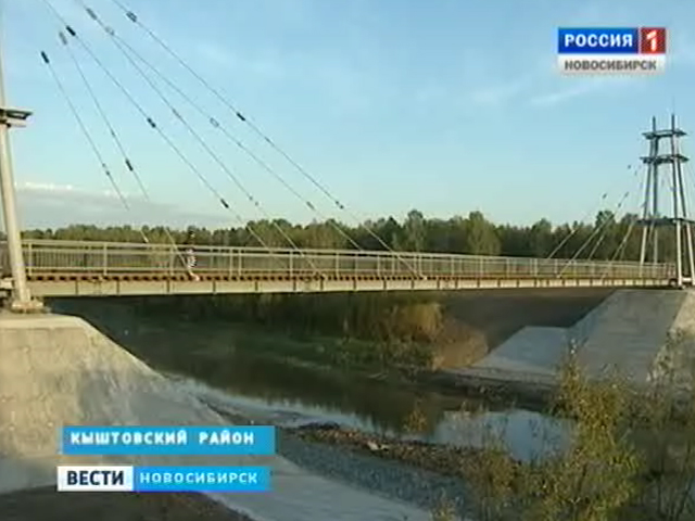 В отдаленных районах Новосибирской области идет массовое строительство дорог и мостов