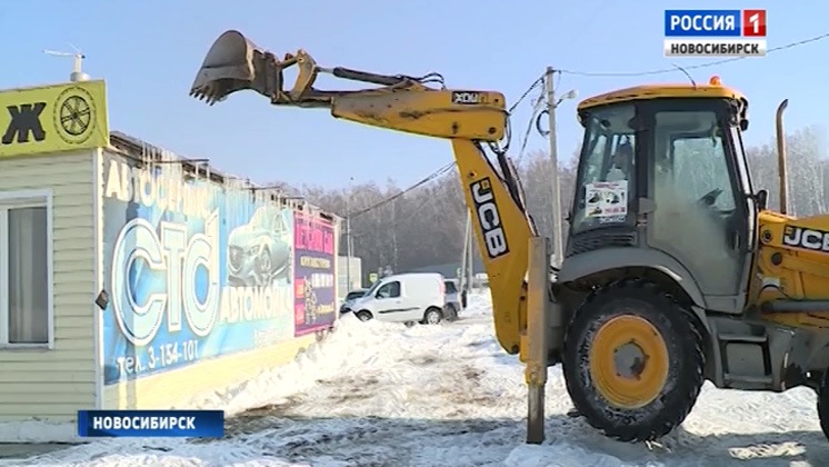 В Новосибирске судебные приставы и спецназ закрыли и снесли здание СТО