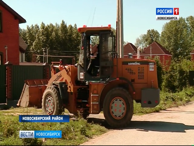 Жители поселка под Новосибирском пожаловались на бульдозеры на дачных участках