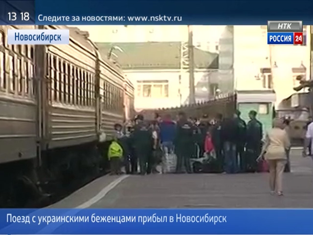 Более 500 человек прибыло из Украины в Новосибирск (прямое включение)