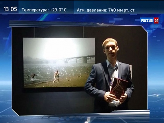 Новосибирец, сфотографировавший град на городском пляже, получил награду в Китае